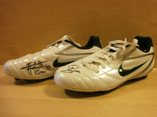 Demba Ba and Papiss Cissé Signed Football Boots Demba Ba and Papiss Cissé Signed Football Boots