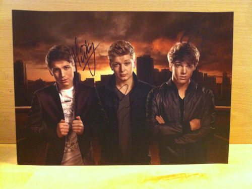 Dan Ferrari-Lane, Micky Parsons, Greg West – District 3 – Signed Colour Photo