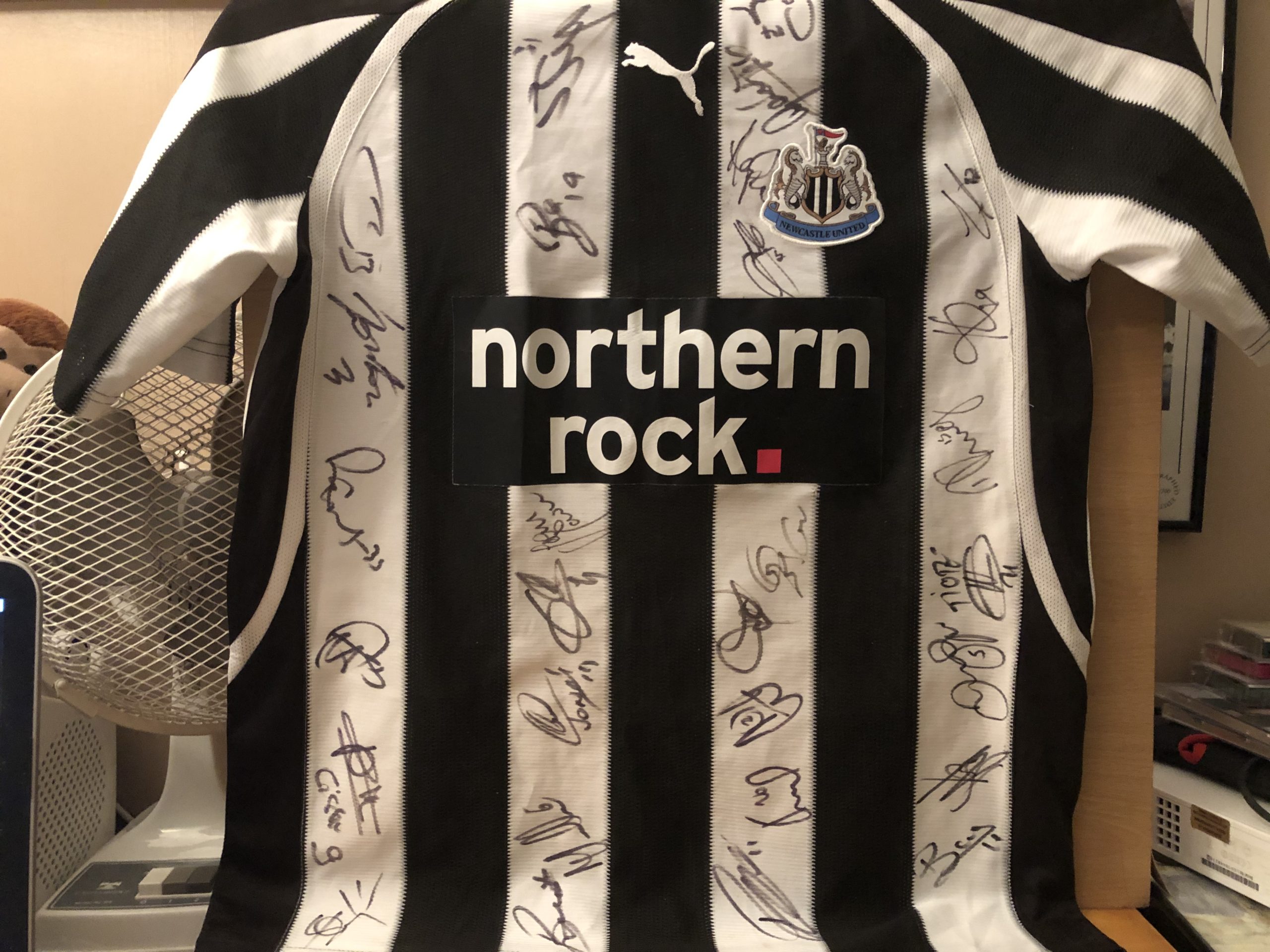Multi Signed Newcastle Football Shirt Multi Signed Newcastle Football Shirt