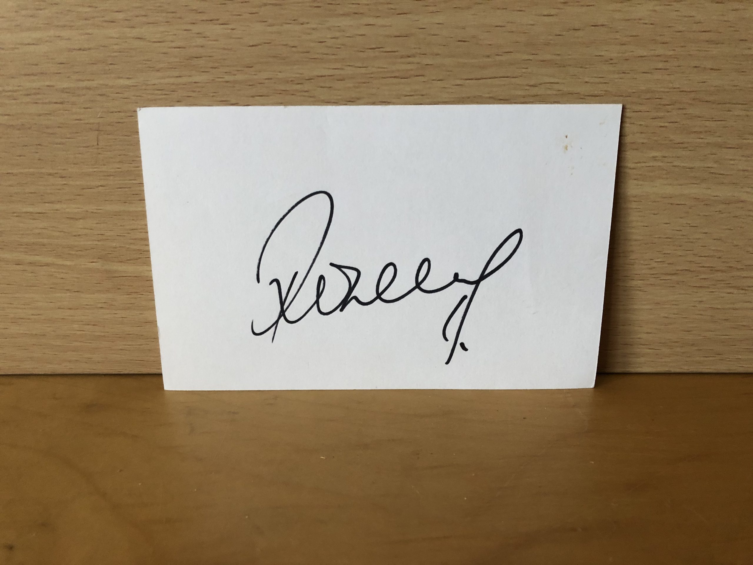 Unknown Signature on white Card