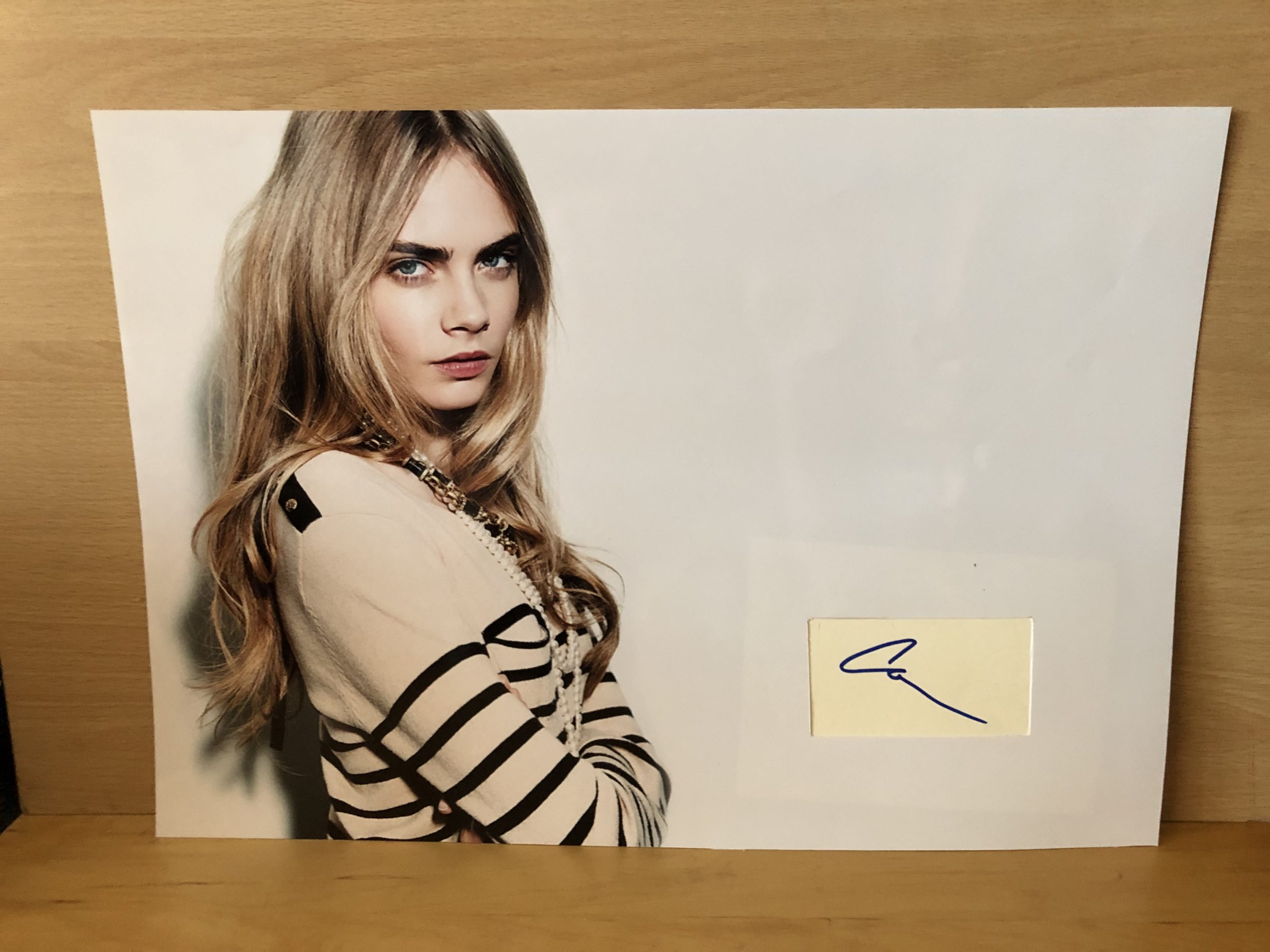 Cara Delevingne Signed White Card Within A3 Colour Photo Cara Delevingne Signed White Card Within A3 Colour Photo